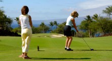 Ladies playing golf for fun and exercise.