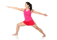 Young lady doing yoga lunge for fun and exercise.