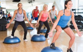 Group exercising at a Gym.