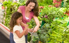 Mother and daughter shopping for healthy foods