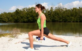 Lifting weights on beach