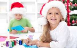 Happy kids making christmas crafts