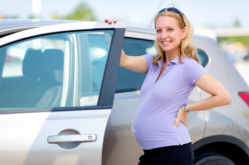 Pregnant Woman by Car